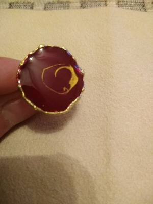 Murano ring like new in burgundy color with gold