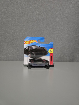 Hot Wheels Ferrari SF90 with slight hook crease, new