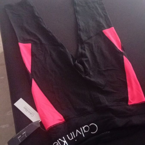 Calvin Klein sports leggings new, black with orange details