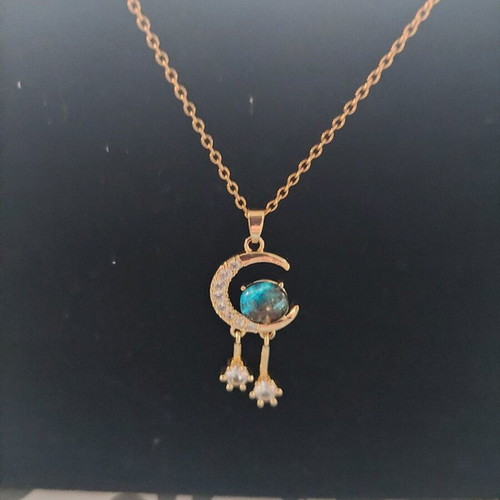 Steel necklace with moon and turquoise stone new, gold color