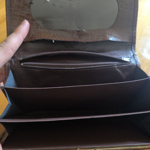 Long vintage brown leather wallet with crocodile pattern and metal corners