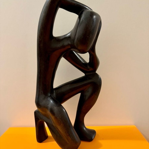 African figure of a thinking man used, solid wood