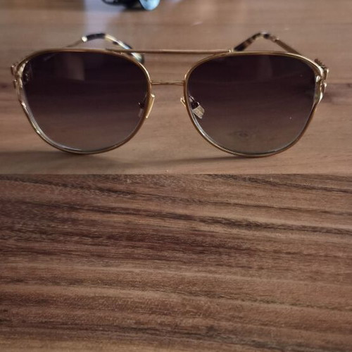 Miu Miu sunglasses like new, gold color
