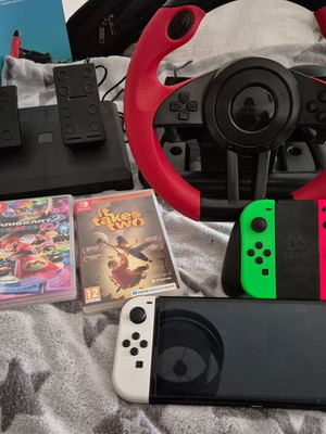 Nintendo Switch OLED конзолен комплект с Joy-Con и волан като нов