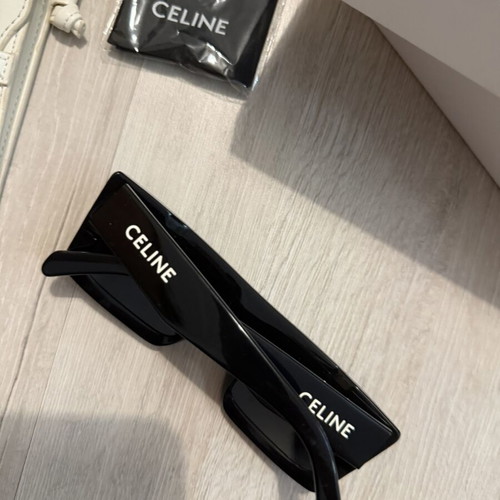 Celine sunglasses used with minor scratches, black