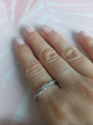 Stainless steel ring with small diamonds like new, silver