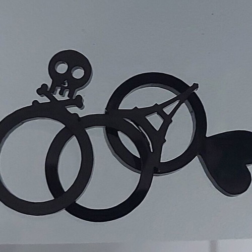 Combination rings like new, set of 3 black with designs