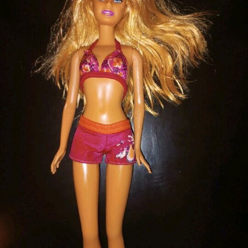 Barbie doll used with minor imperfections, authentic outfit