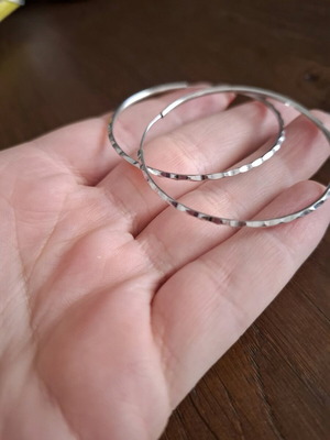 Steel hoop earrings like new, silver color