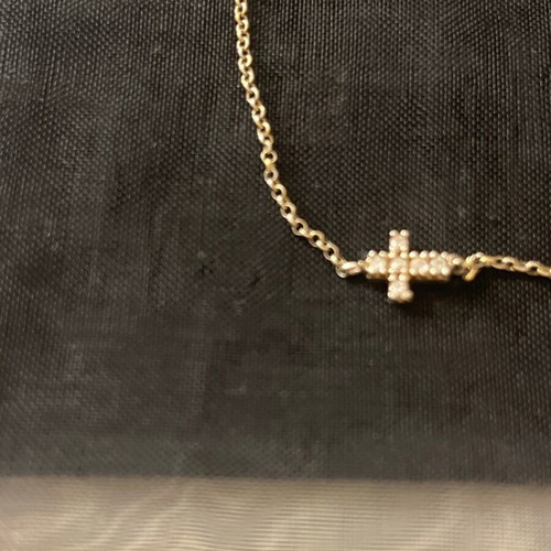 Silver delicate bracelet with cross and eye like new
