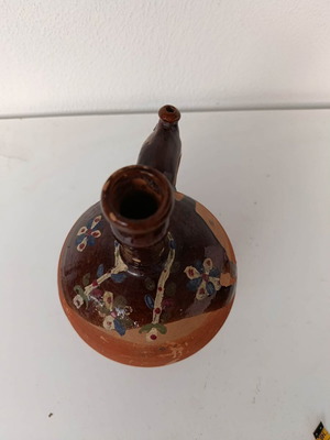 Clay jug with handmade painting used