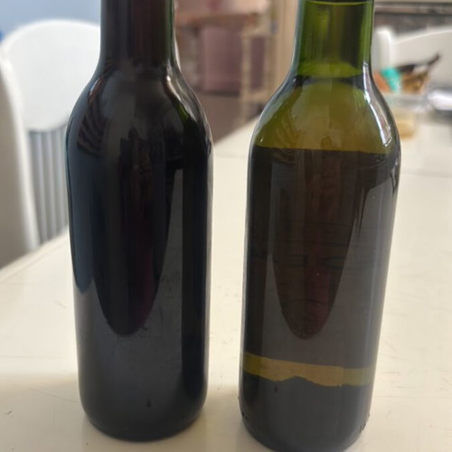 Wine collectible small red and white sealed bottles