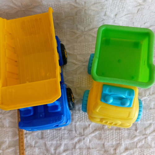 Plastic toy dump trucks used for children