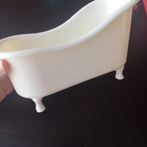 Decorative plastic vintage bathtub organizer used