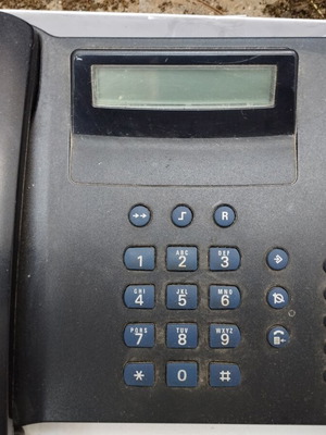 Two phones like new, one landline and one cordless, black and white