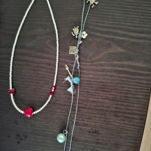 Necklaces pack of 2, like new, colorful, daisy and heart design