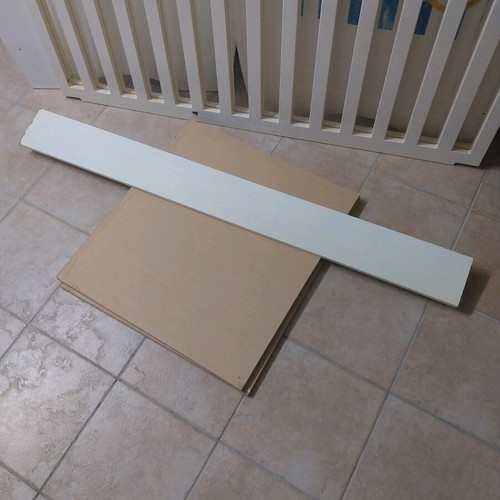 Baby cot used with accessories and fresh sheets