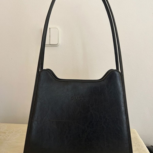 Black shoulder bag used with surface scratch