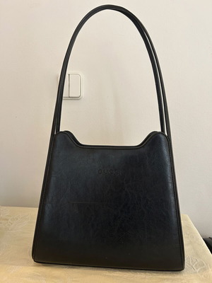 Black shoulder bag used with surface scratch