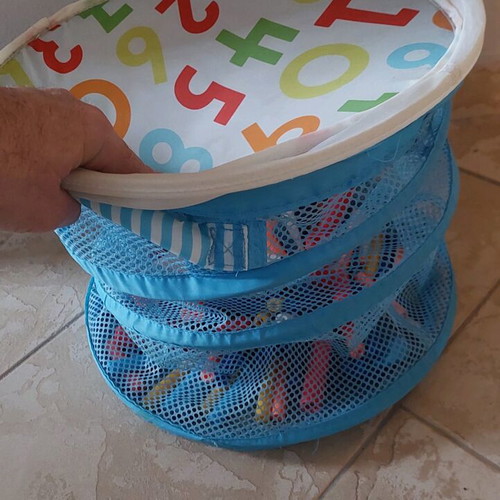 Foldable mesh storage basket with spring like new