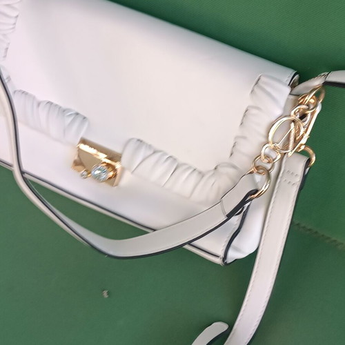 Cafènoir white bag like new with gold clasp and crystals