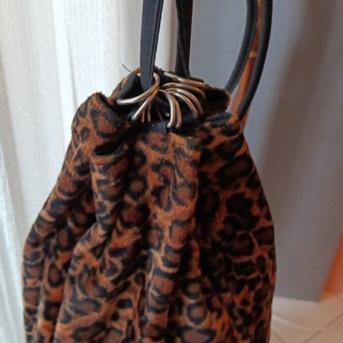 Fur pouch shoulder bag like new, beige and brown
