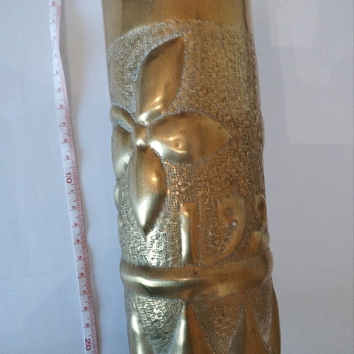 Bronze carved shell casing like new