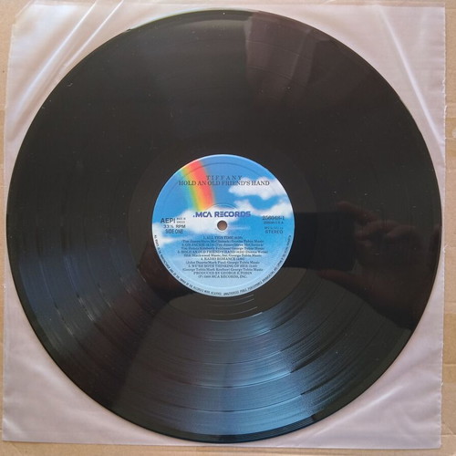 Tiffany Hold An Old Friend's Hand LP like new, electronic