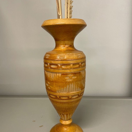 Wooden vase made of beech with traditional carved geometric patterns