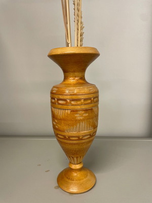 Wooden vase made of beech with traditional carved geometric patterns