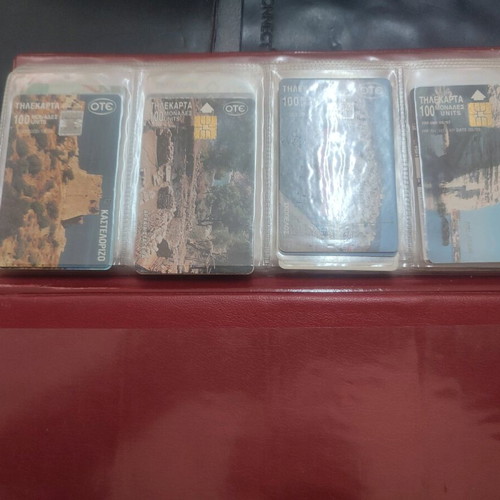 Phone cards used, album with 66 pieces