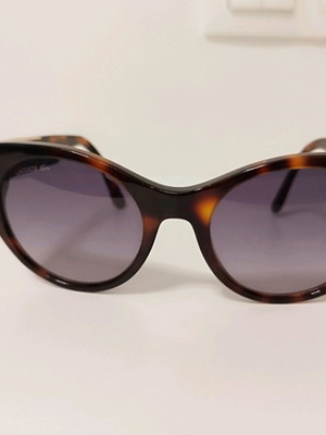 Lacoste tortoise sunglasses like new with blue stripe