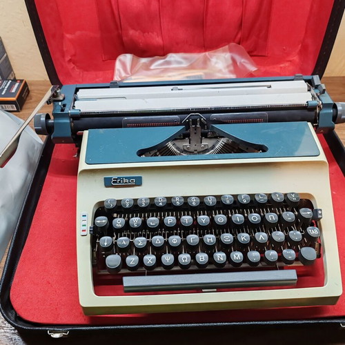 Erika vintage typewriter used with case
