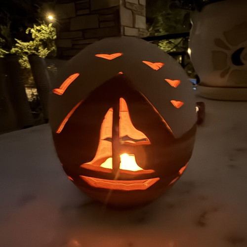 Handmade ceramic lantern with sailboat design, tealight holder