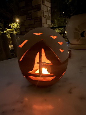 Handmade ceramic lantern with sailboat design, tealight holder