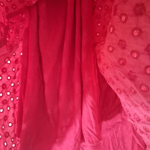 Pink cotton eyelet camisole used with embroidered details