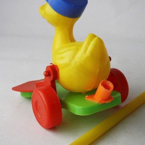 Plastic wheeled vintage 70's duck toy new with stick