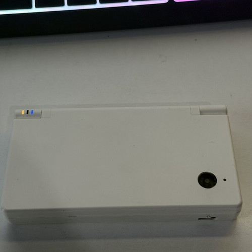 Nintendo DSi used with 1 game and 1 charger