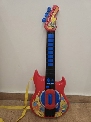 Children's guitar like new, needs battery replacement