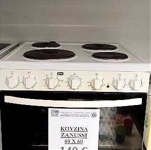 Κουζίνα ZANUSSI 60 x 60 με εμαγιέ εστίες σε άριστη κατάσταση χωρίς κανένα πρόβλημα