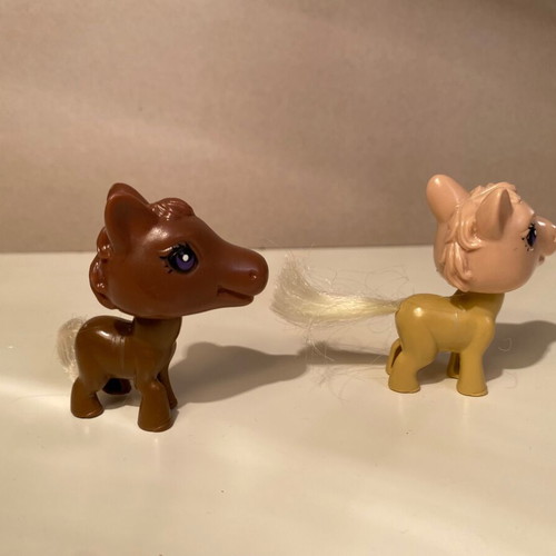Set of small plastic pony figures like new