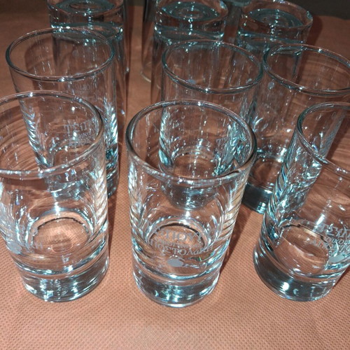 Set of 12 glass tsipouro glasses "ΟΙΚΟΓΕΝΕΙΑΣ ΑΠΟΣΤΟΛΑΚΗ" like new