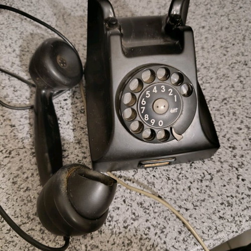 Vintage telephone used, black bakelite with rotary dial