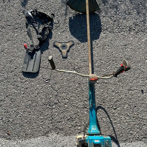 Brushcutter with metal 3T blade, professional shoulder strap, used