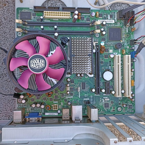Intel DG31PR motherboard with Core 2 Duo E8400, 2GB DDR2 RAM, Cooler Master fan used