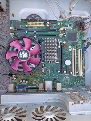 Intel DG31PR motherboard with Core 2 Duo E8400, 2GB DDR2 RAM, Cooler Master fan used