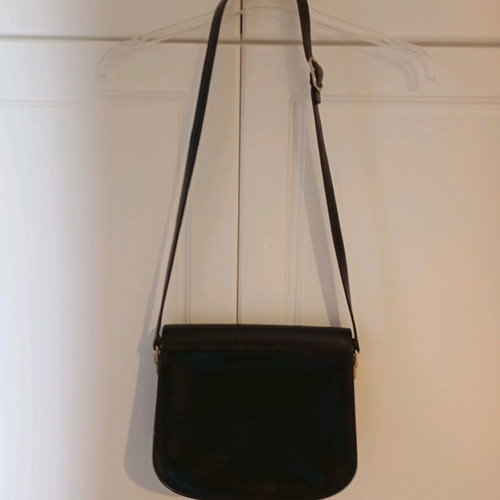 Black leather shoulder bag used with minimal wear
