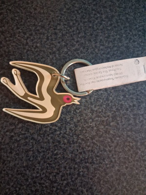Plexiglass keychain with swallow from The Spring fresco, new