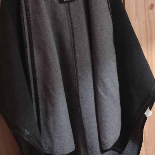Cape used in black and gray color