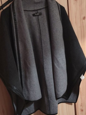 Cape used in black and gray color